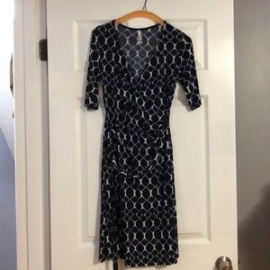 Navy blue and white wrap dress